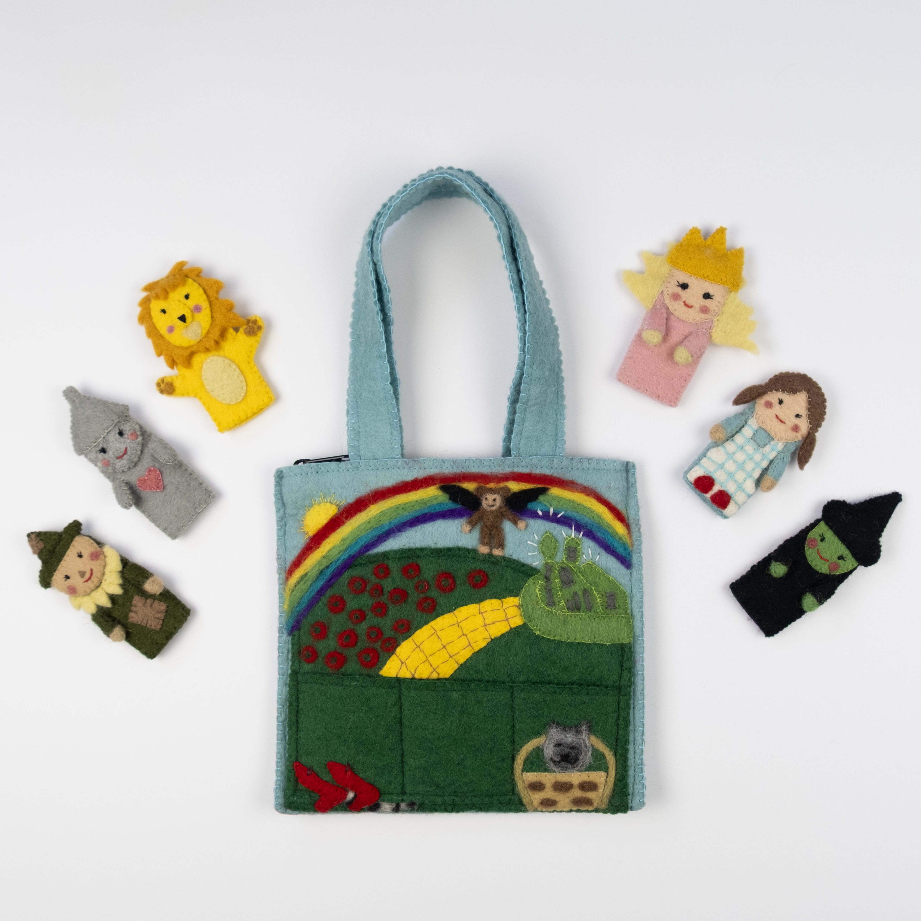fair trade puppet set with a colorful bag featuring a rainbow and characters on a white background, handmade in Nepal | Global Goods Partners