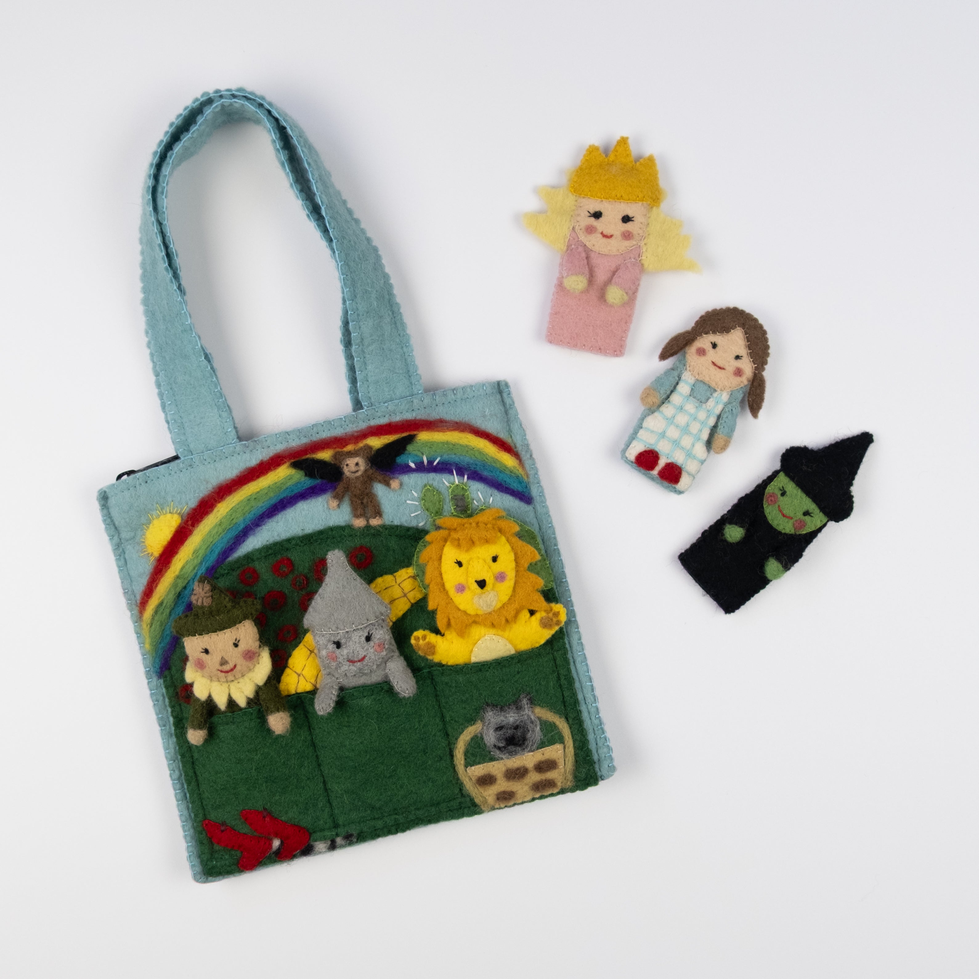 Fair trade felt bag with colorful characters and finger puppets for kids on a white background | Global Goods Partners