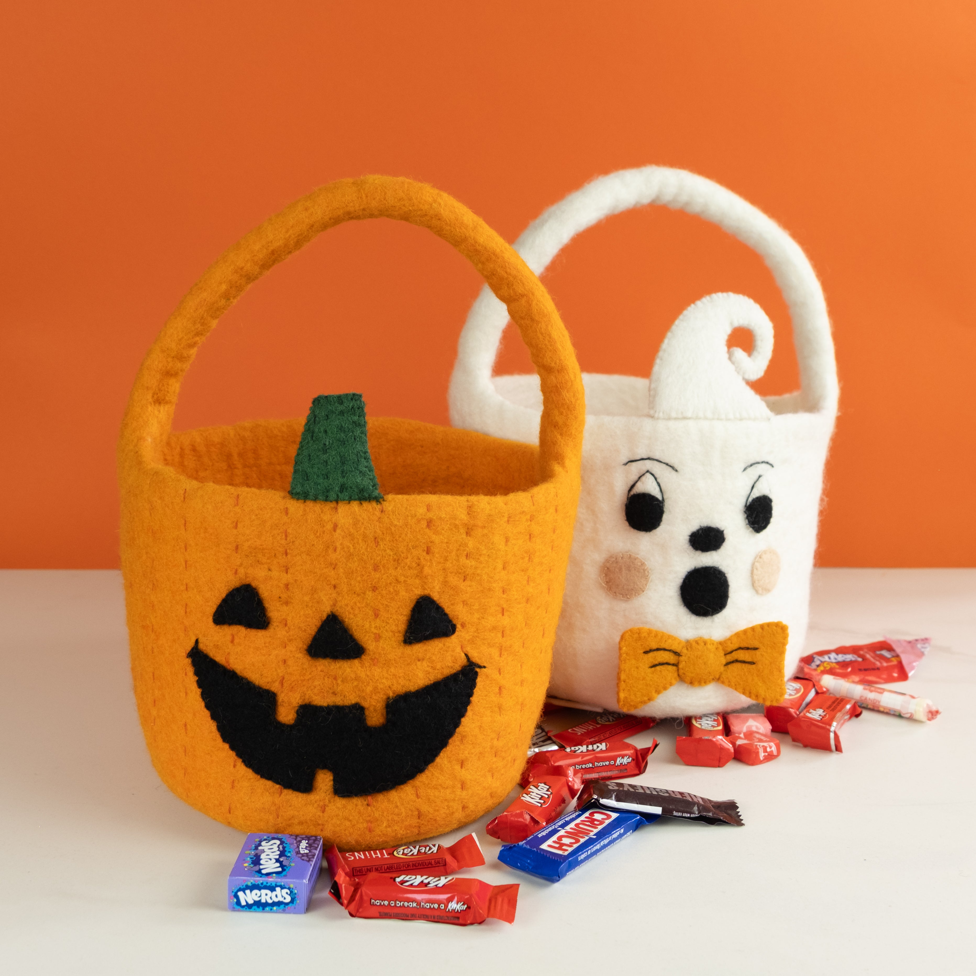 felt halloween trick or treat buckets with candy