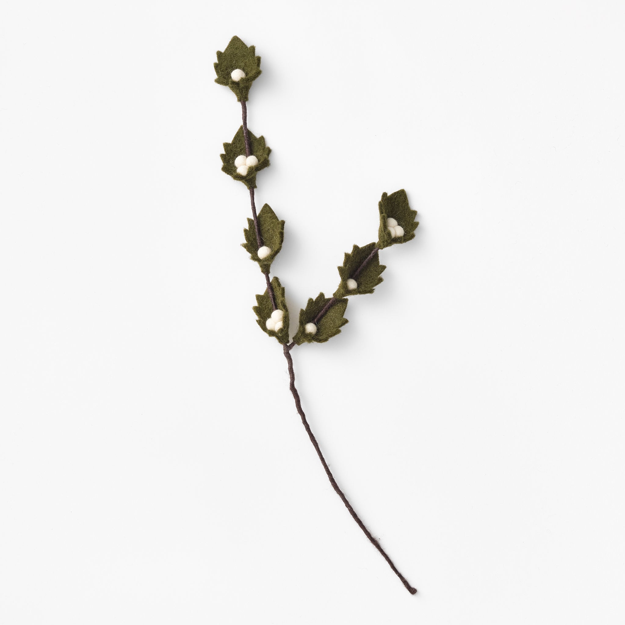 Handmade, wire-wrapped felt green leaf branch with white berries on a white background | Global Goods Partners