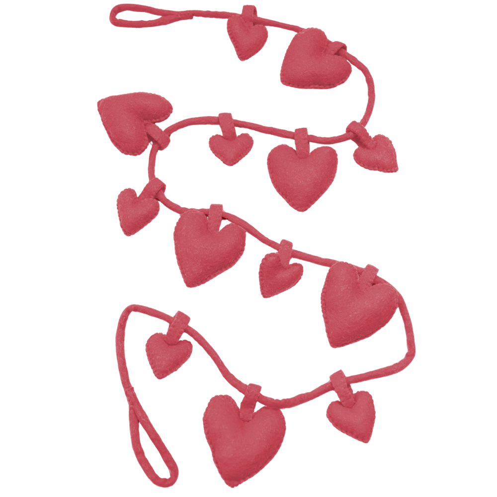 Pink handmade heart-shaped garland on a white background | Global Goods Partners