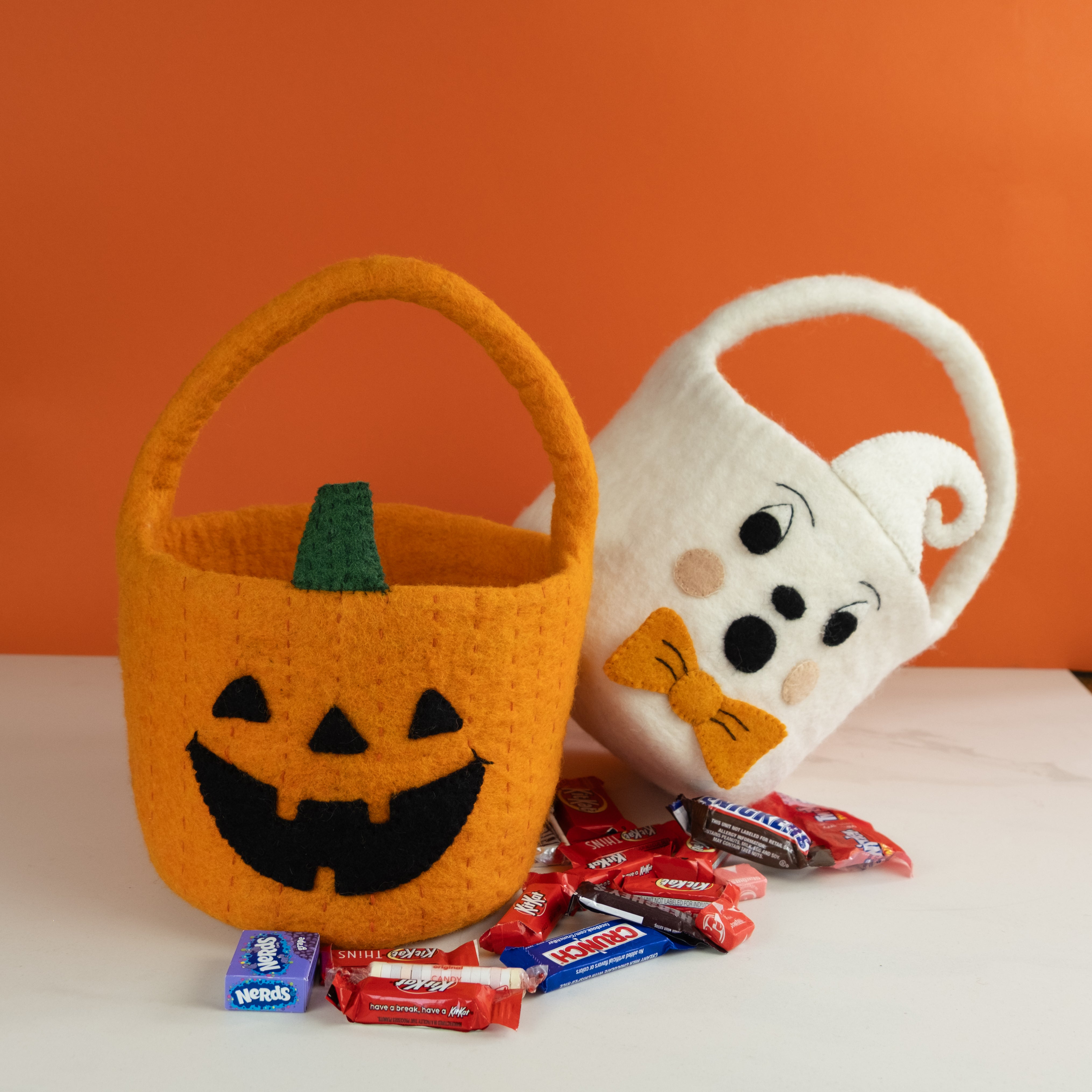 two cute felt trick or treat halloween buckets with candy - fair trade- Global Goods Partners