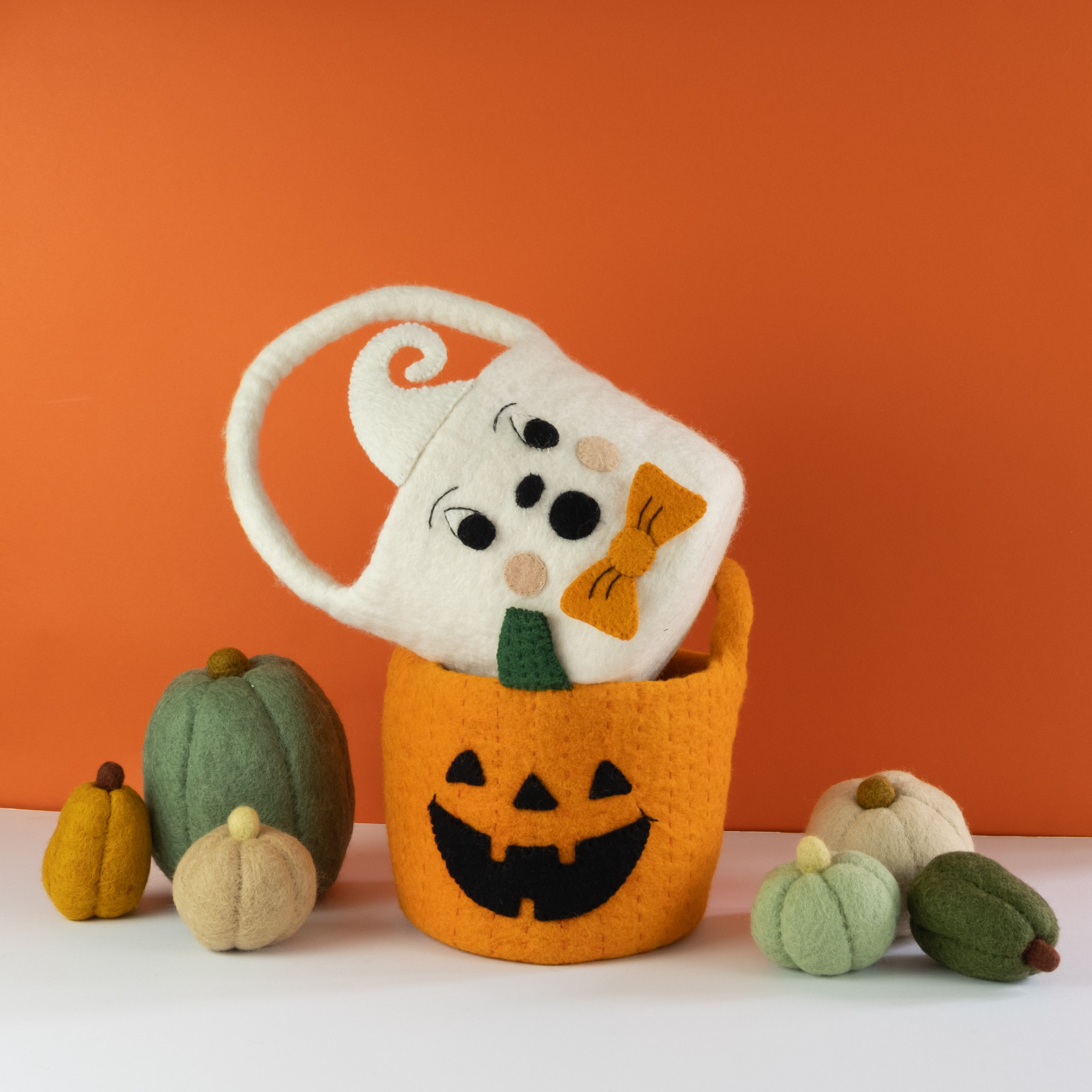 stacked halloween felt buckets for trick or treating
