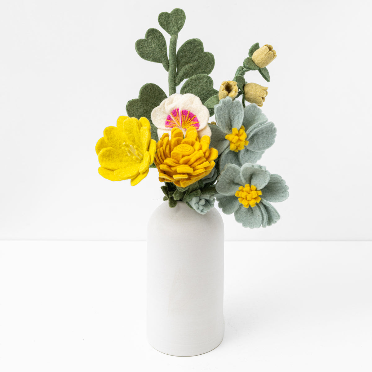 joyful yellow felt flower bouquet great for gifting styled in a white vase - Global Goods Partners Fair Trade