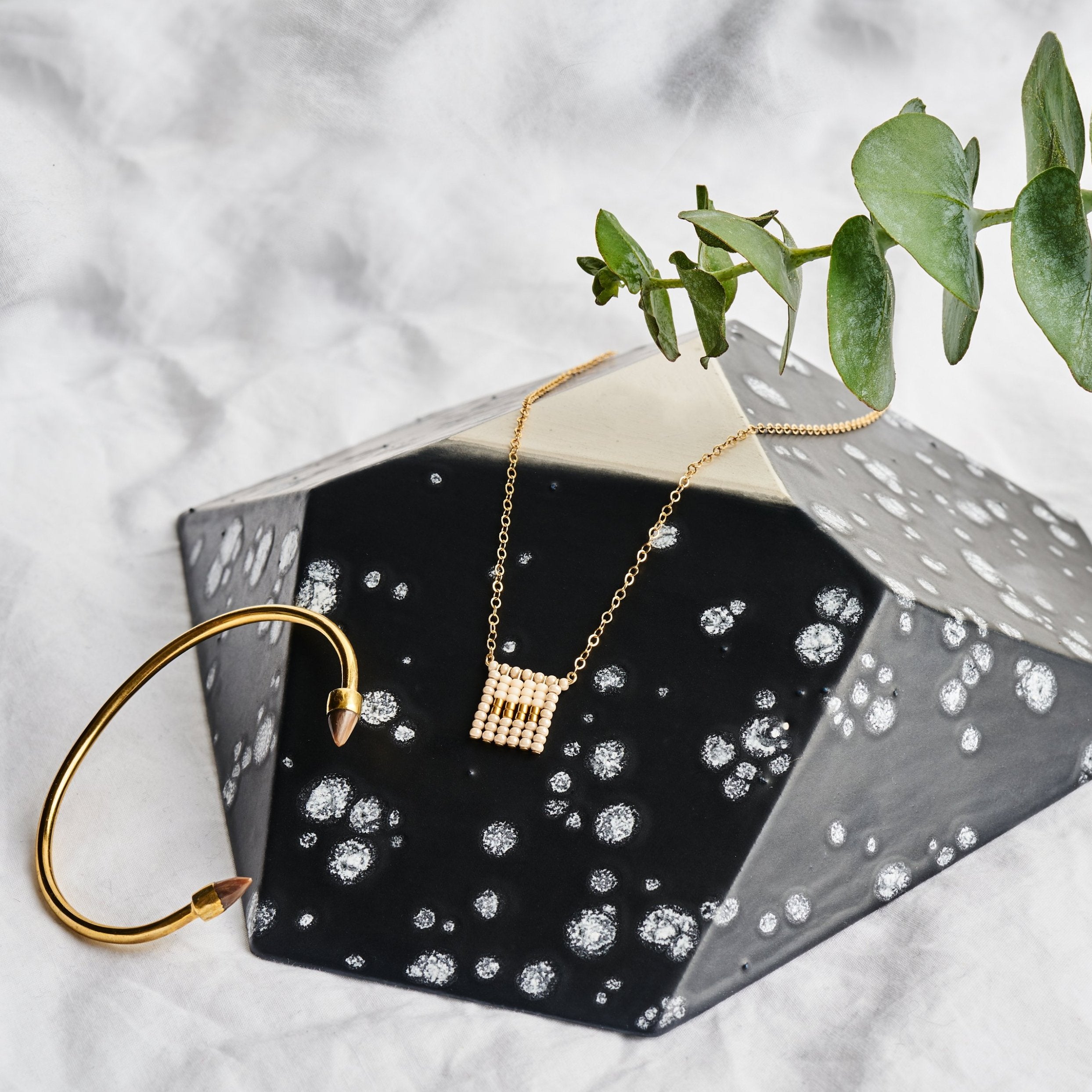 Global Goods Partners | Sidai Designs Nzuri Tassel Block Necklace Black Taupe 14k Gold Chain Glass Bead 24k Handmade Fair Trade Empower Women Artisans Gifts That Give Back Tanzania