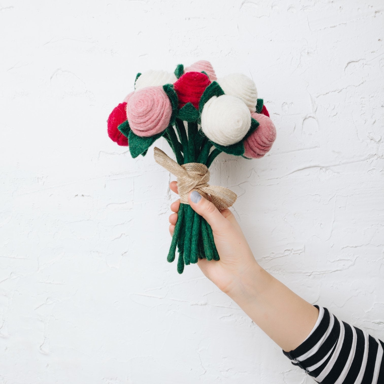 Felt tea roses bouquet in hand - red, pink and white stems - Global Goods Partners- Fair Trade Felt Flowers