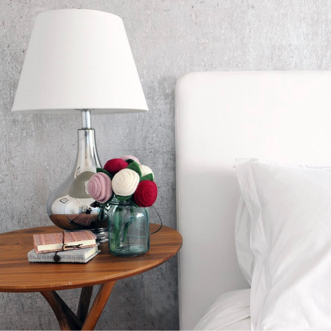 Felt tea roses bouquet on nightstand - red, pink and white stems - Global Goods Partners- Fair Trade Felt Flowers