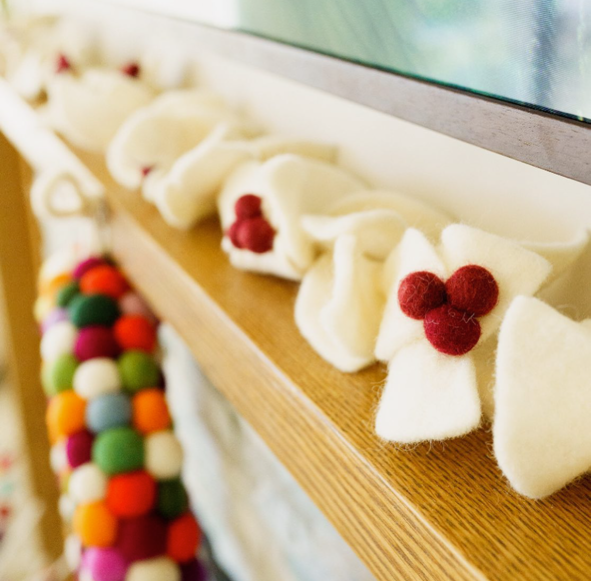 Felt Holiday Garland Red berries on white leaves on a mantle- Fair Trade - Global Goods Partners