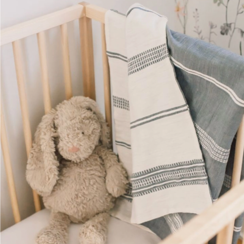 woven blanket fair trade in baby crib | Global Goods Partners