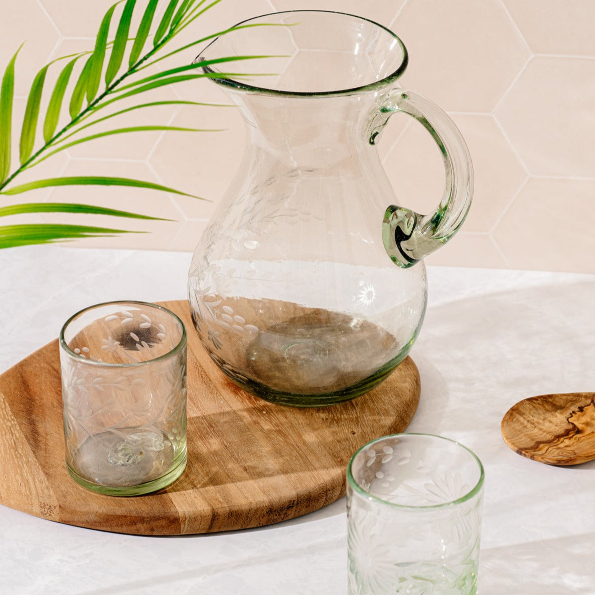 glass pitcher and glassware on table | Fair Trade | Global Goods Partners