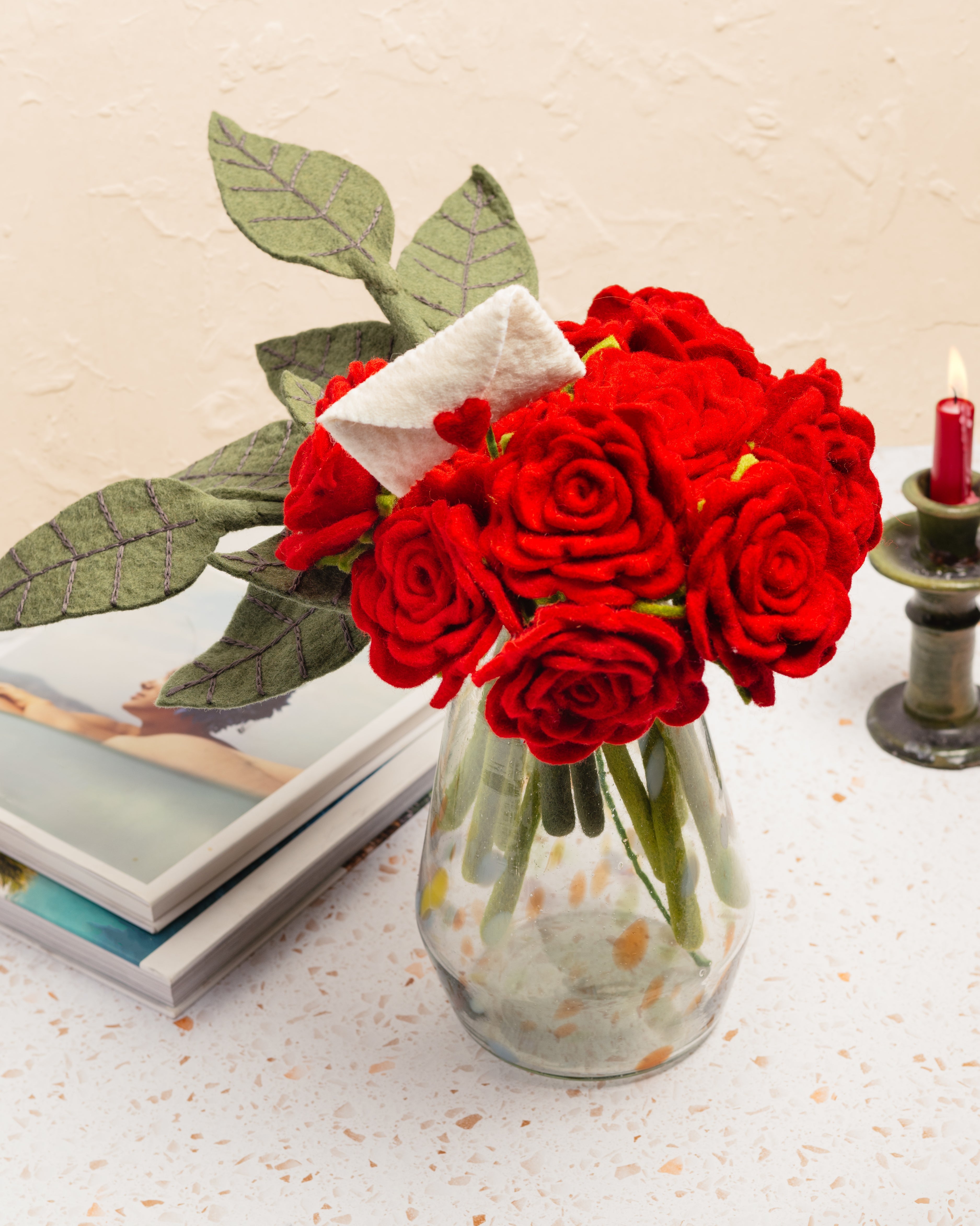 Bouquet of felt red roses and envelope with heart on it. Global Goods Partners.