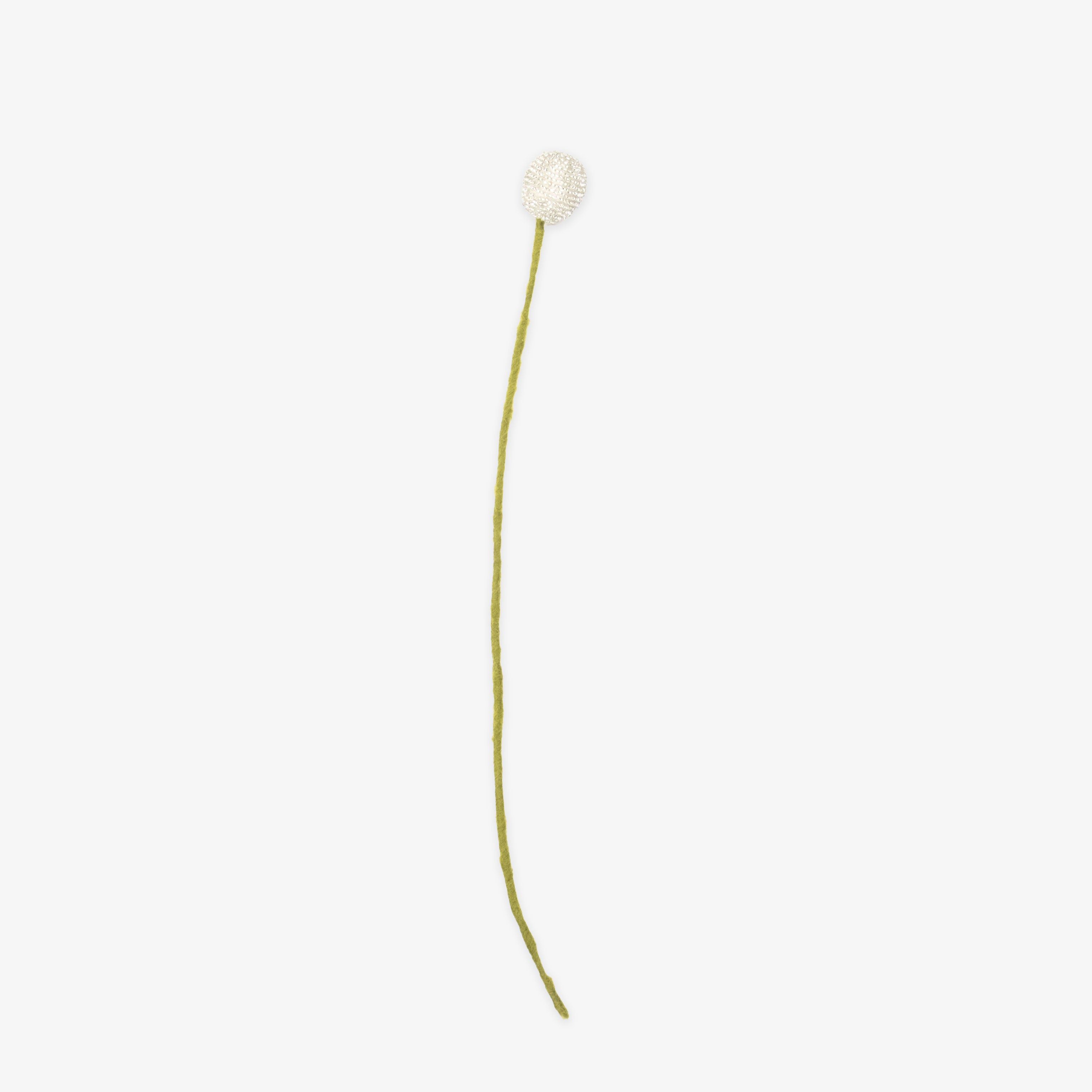 Single white handmade craspedia on a thin green stem against a white background | Global Goods Partners