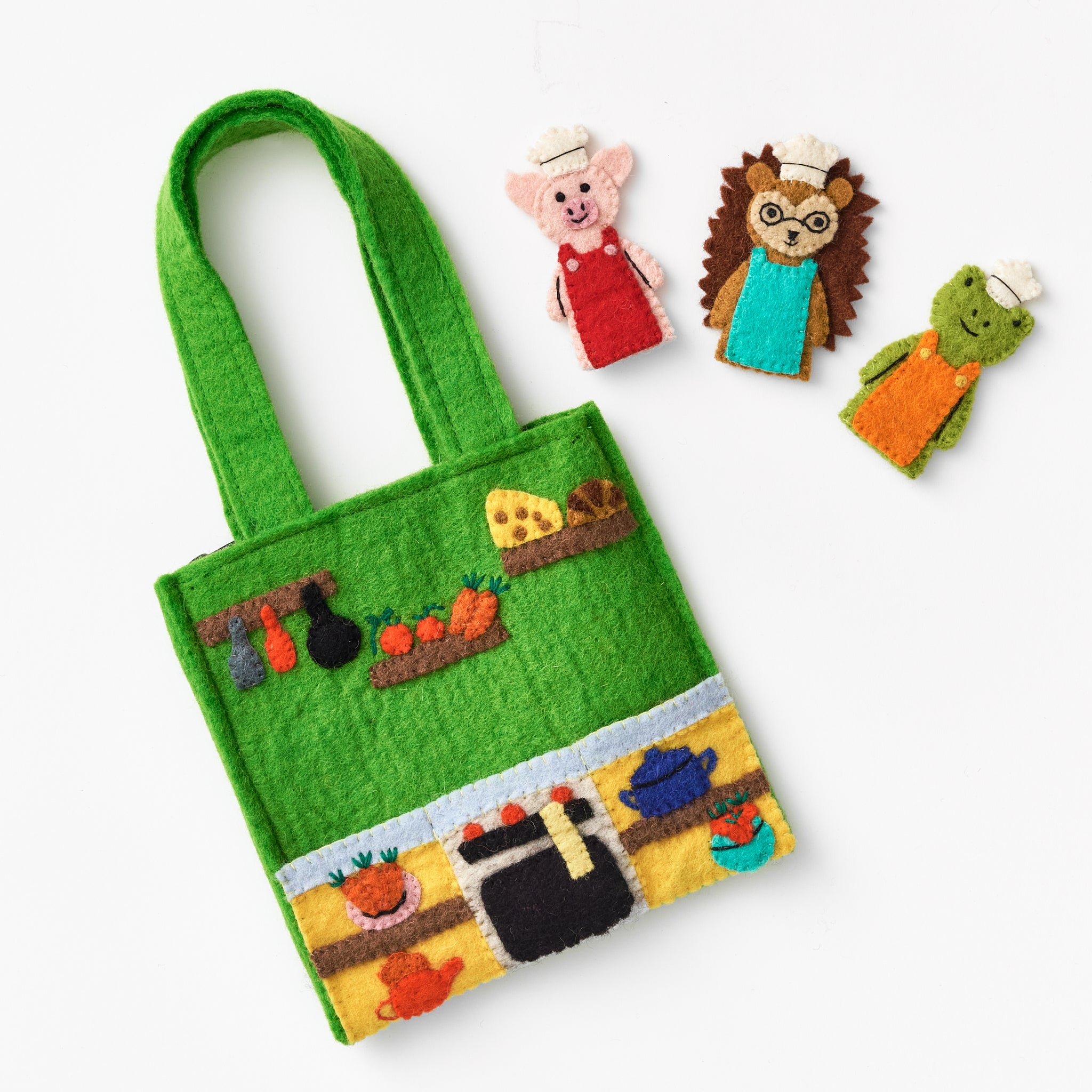 Handmade, fair trade green felt bag with farm-themed design and three colorful animal figures on a white background. Made by women artisans in Nepal | Global Goods Partners
