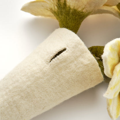 Close-up of a felt vase with a button hole to hang on a white background, handmade and fair trade | Global Goods Partners