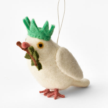 Handmade felt dove ornament with a green statue of liberty crown and olive branch on a white background. Fair trade. | Global Goods Partners