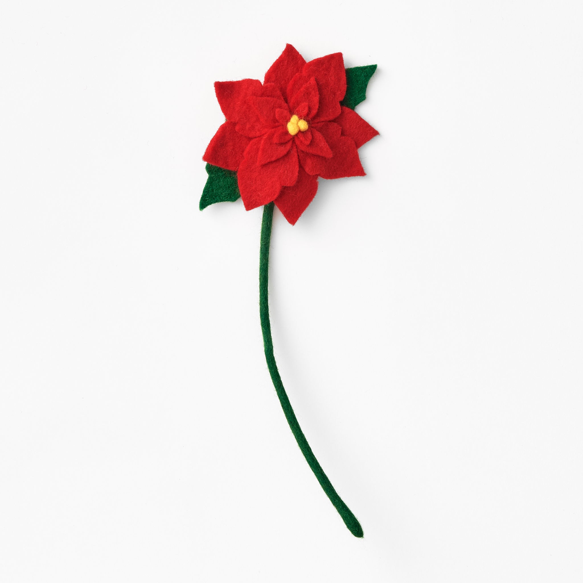 Fair trade red felt poinsettia flower with a green stem on a white background | Global Goods Partners