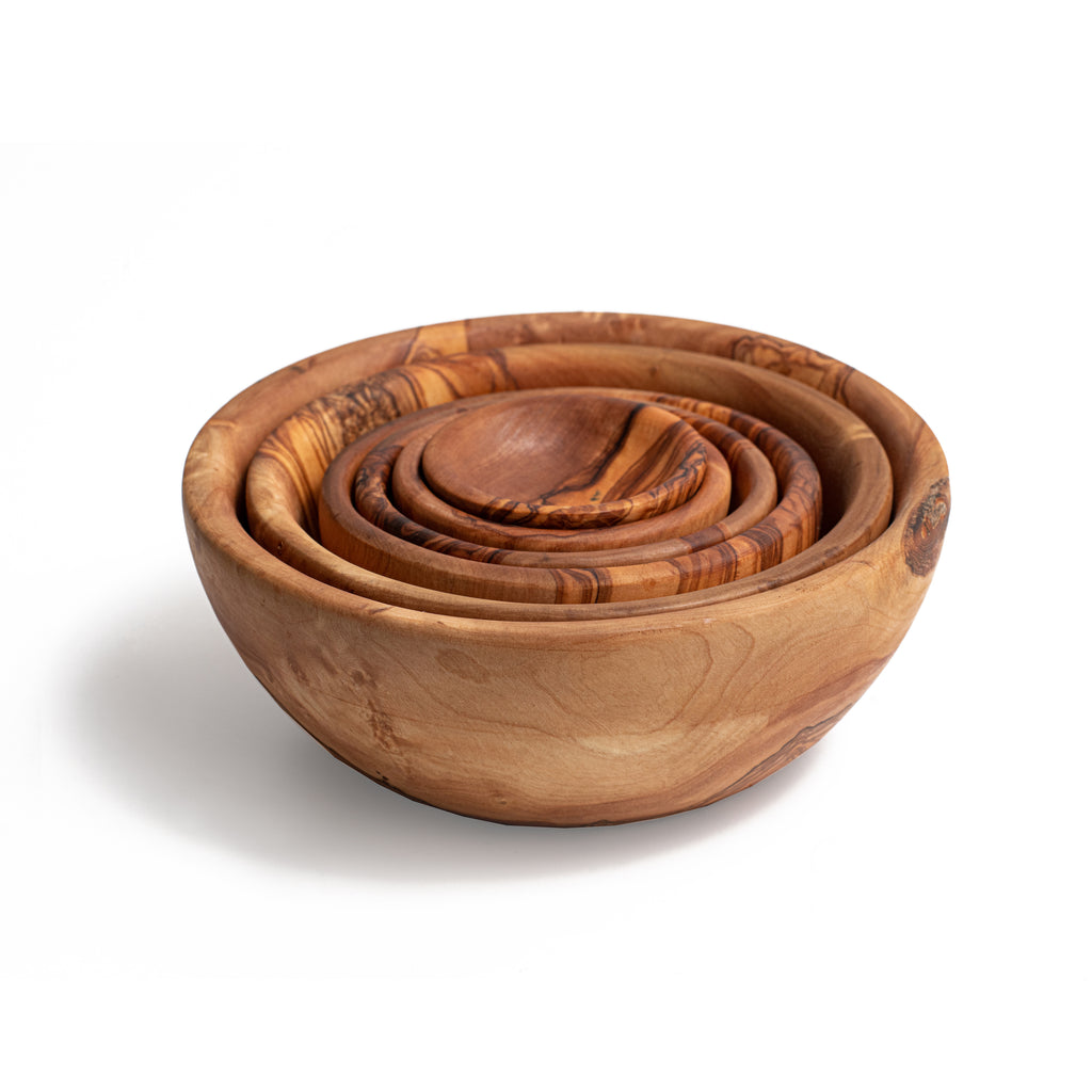 https://globalgoodspartners.org/cdn/shop/files/Global-Goods-Partners-Olive-Wood-Nesting-Bowls-Set-of-6_1024x1024.jpg?v=1688146372