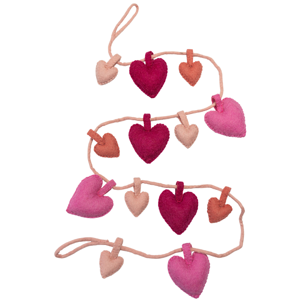 Heart-shaped fair trade garland with pink, red, and orange hearts on a white background | Global Goods Partners