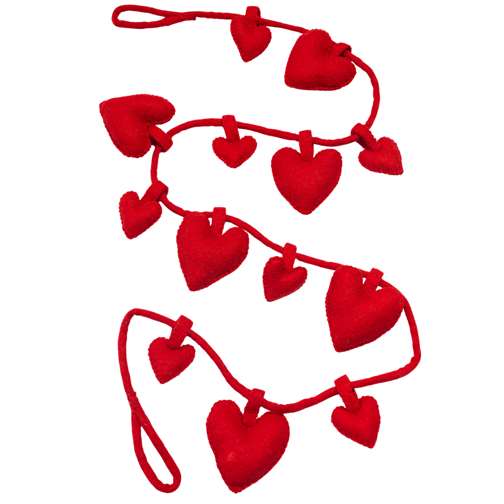 Red heart-shaped garland on a white background | Global Goods Partners