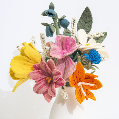 Colorful felt flower bouquet on a white background | Global Goods Partners