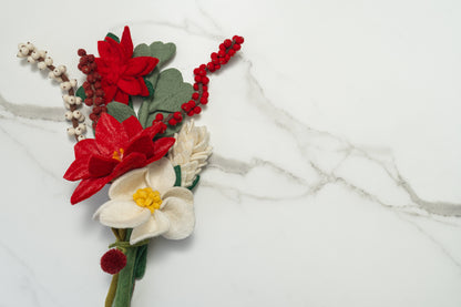 Felt flower bouquet with red, white, and green flowers on a marble surface. Fair trade, handmade and a perfect gift. | Global Goods Partners