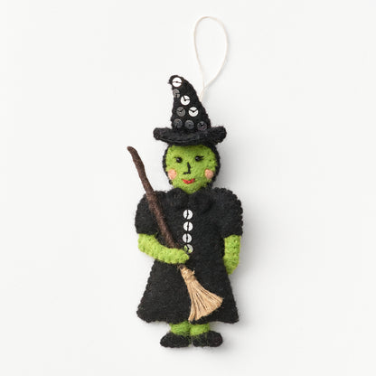 Handmade, fair trade, felt wicked witch Elphaba ornament with a broom on a white background | Global Goods Partners