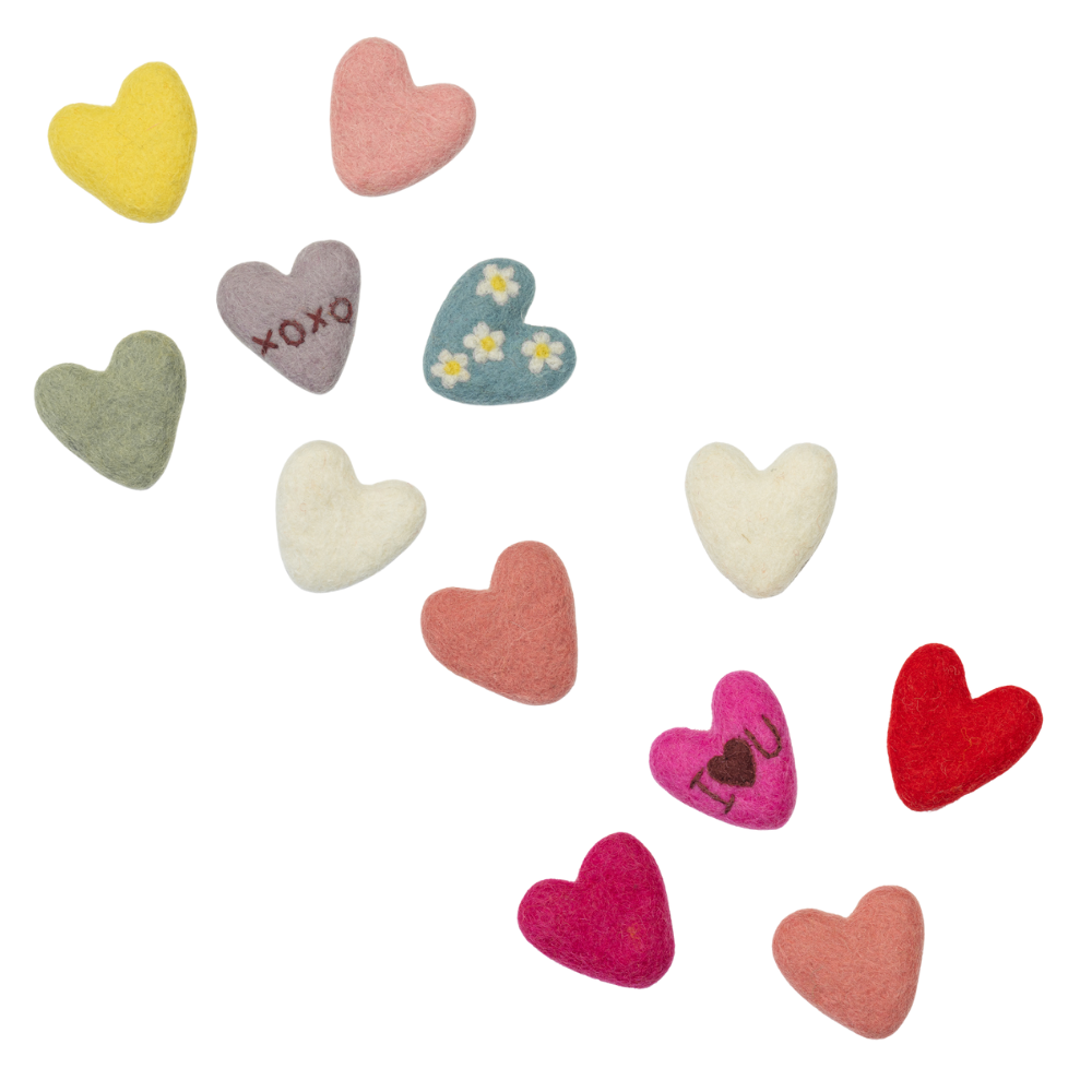 Fair trade felt colorful heart-shaped toys on a white background | Global Goods Partners