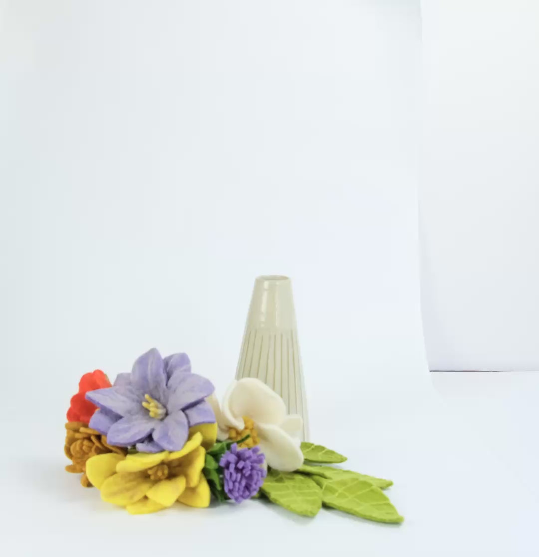 Load video: This video shows customers how to build a bouquet out of felt flowers