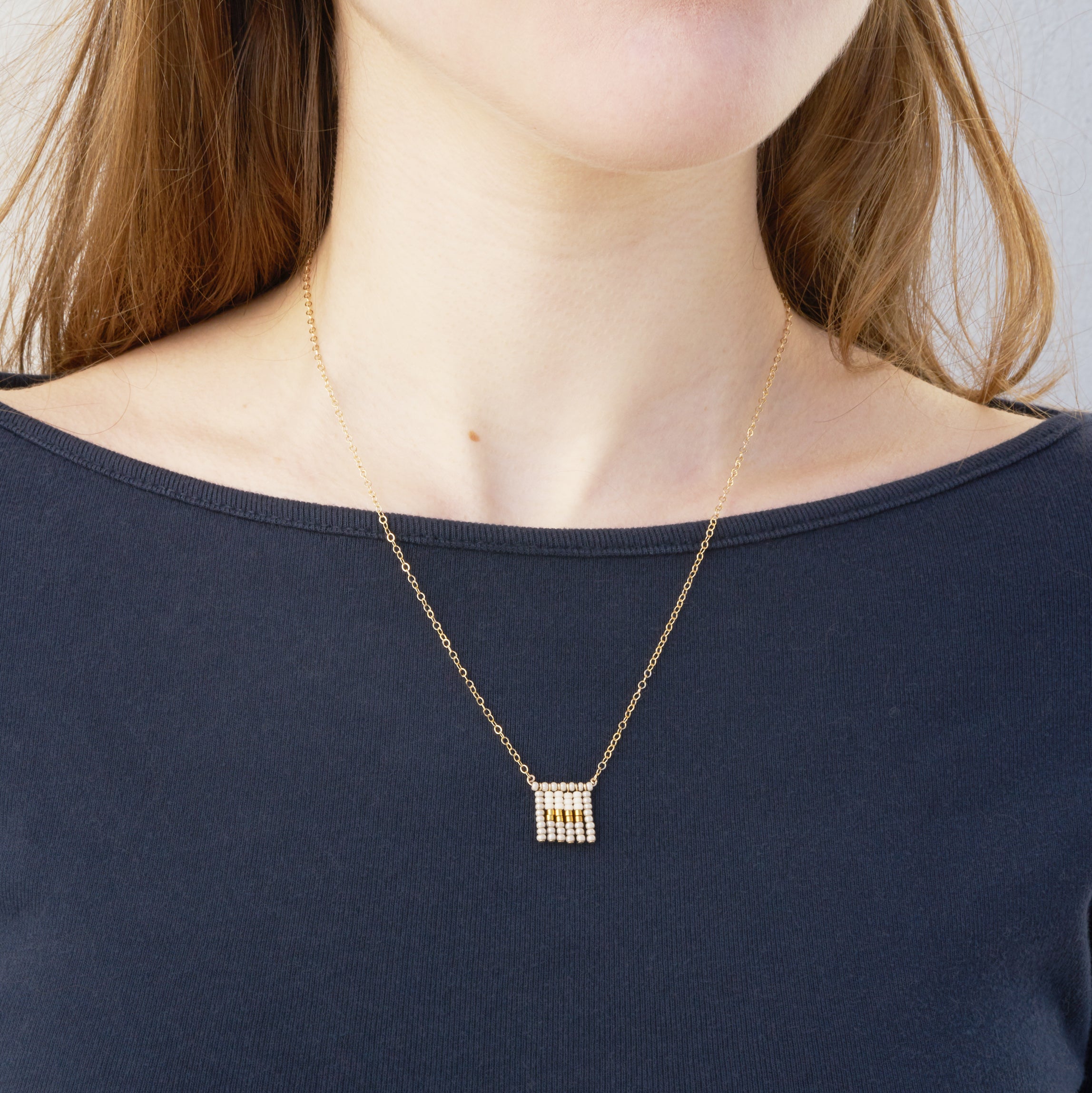 Global Goods Partners | Sidai Designs Nzuri Tassel Block Necklace Black Taupe 14k Gold Chain Glass Bead 24k Handmade Fair Trade Empower Women Artisans Gifts That Give Back Tanzania 