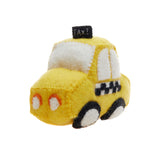 Yellow taxi cab toy made of felt.